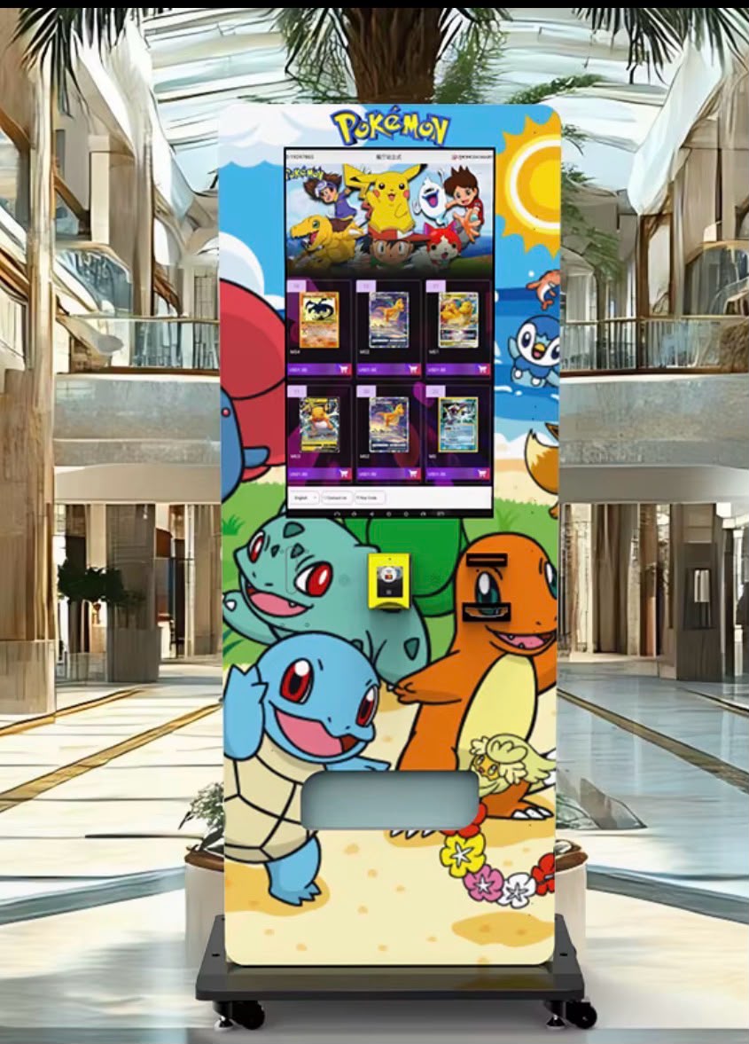 The Card Stop Pokémon card vending machine — a free-standing tower with a full Pokémon wrap and a large touchscreen, installed in a mall
